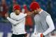 FOXBORO, MA - DECEMBER 16: Colin Kaepernick #7 of the San Francisco 49ers and Alex Smith #11 of the San Francisco 49ers warm up before a game with the New England Patriots at Gillette Stadium on December 16, 2012 in Foxboro, Massachusetts. (Photo by Jim Rogash/Getty Images)