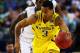 ARLINGTON, TX - MARCH 31: Trey Burke #3 of the Michigan Wolverines drives against the Florida Gators in the second half during the South Regional Round Final of the 2013 NCAA Men's Basketball Tournament at Dallas Cowboys Stadium on March 31, 2013 in Arlington, Texas. (Photo by Tom Pennington/Getty Images)