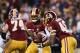 LANDOVER, MD - JANUARY 06: Robert Griffin III #10 and Alfred Morris #46 of the Washington Redskins run a play against the Seattle Seahawks during the NFC Wild Card Playoff Game at FedExField on January 6, 2013 in Landover, Maryland. (Photo by Win McNamee/Getty Images)