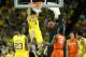 ATLANTA, GA - APRIL 06: Mitch McGary #4 of the Michigan Wolverines dunks against Rakeem Christmas #25 of the Syracuse Orange in the second half during the 2013 NCAA Men's Final Four Semifinal at the Georgia Dome on April 6, 2013 in Atlanta, Georgia. (Photo by Streeter Lecka/Getty Images)
