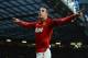 MANCHESTER, ENGLAND - FEBRUARY 10: Robin van Persie of Manchester United celebrates scoring his team's second goal during the Barclays Premier League match between Manchester United and Everton at Old Trafford on February 10, 2013 in Manchester, England. (Photo by Shaun Botterill/Getty Images)