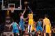LOS ANGELES, CA - JANUARY 29: Dwight Howard #12 of the Los Angeles Lakers shoots over Robin Lopez #15 of the New Orleans Hornets at Staples Center on January 29, 2013 in Los Angeles, California. NOTE TO USER: User expressly acknowledges and agrees that, by downloading and or using this photograph, User is consenting to the terms and conditions of the Getty Images License Agreement. (Photo by Stephen Dunn/Getty Images)