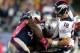 FOXBORO, MA - OCTOBER 7: Jermaine Cunningham #96 and Chandler Jones #95 of the New England Patriots rough up Peyton Manning #18 of the Denver Broncos after he released a pass during the second half at Gillette Stadium on October 7, 2012 in Foxboro, Massachusetts. (Photo by Jim Rogash/Getty Images)