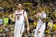 ATLANTA, GA - APRIL 06: (L-R) Luke Hancock #11 and Chane Behanan #21 of the Louisville Cardinals celebrate after they won 72-68 against the Wichita State Shockers during the 2013 NCAA Men's Final Four Semifinal at the Georgia Dome on April 6, 2013 in Atlanta, Georgia. (Photo by Kevin C. Cox/Getty Images)