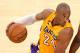 Apr 5, 2013; Los Angeles, CA, USA; Los Angeles Lakers shooting guard Kobe Bryant (24) is defended by Memphis Grizzlies power forward Zach Randolph (50) during the fourth quarter at the Staples Center. Mandatory Credit: Jake Roth-USA TODAY Sports