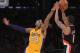 LOS ANGELES, CA - DECEMBER 28: Kobe Bryant #24 of the Los Angeles Lakers attempts to block the shot of Damian Lillard #0 of the Portland Trail Blazers at Staples Center on December 28, 2012 in Los Angeles, California. The Lakers won 104-87. NOTE TO USER: User expressly acknowledges and agrees that, by downloading and or using this photograph, User is consenting to the terms and conditions of the Getty Images License Agreement. (Photo by Harry How/Getty Images)
