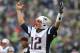 SEATTLE, WA - OCTOBER 14: Quarterback Tom Brady #12 of the New England Patriots celebrates after throwing a touchdown pass in the first half against the Seattle Seahawks at CenturyLink Field on againstOctober 14, 2012 in Seattle, Washington. (Photo by Otto Greule Jr/Getty Images)