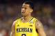 ATLANTA, GA - APRIL 08: Trey Burke #3 of the Michigan Wolverines reacts against the Louisville Cardinals during the 2013 NCAA Men's Final Four Championship at the Georgia Dome on April 8, 2013 in Atlanta, Georgia. Louisville won 82-76. (Photo by Andy Lyons/Getty Images)