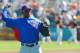 Mar 2, 2013; Scottsdale, AZ, USA; Chicago Cubs right fielder Jorge Soler (68) warms up before a game against the San Francisco Giants at Scottsdale Stadium. Mandatory Credit: Jake Roth-USA TODAY Sports