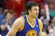 Mar 17, 2013; Houston, TX, USA; Golden State Warriors center Andrew Bogut (12) controls the ball during the third quarter against the Houston Rockets at Toyota Center. Mandatory Credit: Troy Taormina-USA TODAY Sports