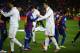 BARCELONA, SPAIN - JANUARY 25: Lionel Messi of FC Barcelona (L) shakes hands with Cristiano Ronaldo of Real Madrid prior to the Copa del Rey quarter final second leg match between FC Barcelona and Real Madrid at Camp Nou on January 25, 2012 in Barcelona, Spain. (Photo by David Ramos/Getty Images)