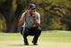 AUGUSTA, GA - APRIL 11: Tiger Woods of the United States lines up a putt on the 18th hole during the first round of the 2013 Masters Tournament at Augusta National Golf Club on April 11, 2013 in Augusta, Georgia. (Photo by Mike Ehrmann/Getty Images)