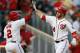 WASHINGTON, DC - APRIL 12: Bryce Harper #34 of the Washington Nationals celebrates with Denard Span #2 after hitting a two RBI home run against the Atlanta Braves during the first inning at Nationals Park on April 12, 2013 in Washington, DC. (Photo by Rob Carr/Getty Images)
