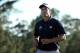 AUGUSTA, GA - APRIL 13: Adam Scott of Australia reacts on the 18th green during the third round of the 2013 Masters Tournament at Augusta National Golf Club on April 13, 2013 in Augusta, Georgia. (Photo by Andrew Redington/Getty Images)