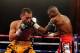 NEW YORK, NY - APRIL 13: Guillermo Rigondeaux punches Nonito Donaire during their WBO/WBA junior featherweight title unification bout at Radio City Music Hall on April 13, 2013 in New York City. (Photo by Al Bello/Getty Images)