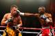 NEW YORK, NY - APRIL 13: Guillermo Rigondeaux punches Nonito Donaire during their WBO/WBA junior featherweight title unification bout at Radio City Music Hall on April 13, 2013 in New York City. (Photo by Al Bello/Getty Images)