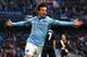 MANCHESTER, ENGLAND - JANUARY 19: David Silva of Manchester City celebrates after scoring the opening goal during the Barclays Premier League match between Manchester City and Fulham at Etihad Stadium on January 19, 2013 in Manchester, England. (Photo by Alex Livesey/Getty Images)