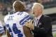 ARLINGTON, TX - AUGUST 21: Dallas Cowboys team owner Jerry Jones talks with linebacker DeMarcus Ware #94 prior to the Cowboys taking the field against the Tennessee Titans during a preseason game at Cowboys Stadium on August 21, 2009 in Arlington, Texas. (Photo by Tom Pennington/Getty Images)
