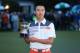 AUGUSTA, GA - APRIL 14: Tianlang Guan of China poses after winning low amateur honors after the final round of the 2013 Masters Tournament at Augusta National Golf Club on April 14, 2013 in Augusta, Georgia. (Photo by Mike Ehrmann/Getty Images)