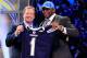 NEW YORK, NY - APRIL 28: NFL Commissioner Roger Goodell (L) poses for a photo with Corey Liuget, #18 overall pick by the San Diego Chargers, on stage during the 2011 NFL Draft at Radio City Music Hall on April 28, 2011 in New York City. (Photo by Chris Trotman/Getty Images)