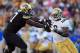 BOULDER, CO - SEPTEMBER 29: Offensive linesman Stephane Nembot #77 of the Colorado Buffaloes blocks defensive end Datone Jones #56 of the UCLA Bruins at Folsom Field on September 29, 2012 in Boulder, Colorado. UCLA defeated Colorado 42-14. (Photo by Doug Pensinger/Getty Images)