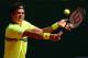 MONTE-CARLO, MONACO - APRIL 15: Milos Raonic of Canada plays a backhand against Julien Benneteau of France in their first round match during day two of the ATP Monte Carlo Masters,at Monte-Carlo Sporting Club on April 15, 2013 in Monte-Carlo, Monaco. (Photo by Clive Brunskill/Getty Images)