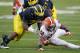 ANN ARBOR, MI - OCTOBER 13: Dami Ayoola #22 of the Illinois Fighting Illini can't come up with a third quarter pass while being hit by William Campbell #73 of the Michigan Wolverines at Michigan Stadium on October 13, 2012 in Ann Arbor, Michigan. Michigan won the game 45-0. (Photo by Gregory Shamus/Getty Images)