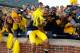 ANN ARBOR, MI - NOVEMBER 17: Players of the Michigan Wolverines celebrate a 42-17 win over the Iowa Hawkeyes with fans at Michigan Stadium on November 17, 2012 in Ann Arbor, Michigan. (Photo by Gregory Shamus/Getty Images)