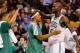 BOSTON, MA - FEBRUARY 7: Kevin Garnett #5 of the Boston Celtics is congratulated by teammate Paul Pierce #34 after coming out of the game in the fourth quarter against the Los Angeles Lakers during the game on February 7, 2013 at TD Garden in Boston, Massachusetts. NOTE TO USER: User expressly acknowledges and agrees that, by downloading and or using this photograph, User is consenting to the terms and conditions of the Getty Images License Agreement. (Photo by Jared Wickerham/Getty Images)
