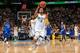 DENVER, CO - APRIL 04: Andre Iguodala #9 of the Denver Nuggets heads down court on a solo break away against the Dallas Mavericks at the Pepsi Center on April 4, 2013 in Denver, Colorado. The Nuggets defeated the Mavericks 95-94. NOTE TO USER: User expressly acknowledges and agrees that, by downloading and or using this photograph, User is consenting to the terms and conditions of the Getty Images License Agreement. (Photo by Doug Pensinger/Getty Images)