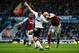 LONDON, ENGLAND - APRIL 17: Robin van Persie of Manchester United battles for the ball with Winston Reid (L) and James Collins of West Ham United during the Barclays Premier League match between West Ham United and Manchester United at the Boleyn Ground on April 17, 2013 in London, England. (Photo by Jamie McDonald/Getty Images)