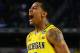 ARLINGTON, TX - MARCH 29: Trey Burke #3 of the Michigan Wolverines reacts after shooting a game tying three pointer in the final seconds of the second half againist the Kansas Jayhawks during the South Regional Semifinal round of the 2013 NCAA Men's Basketball Tournament at Dallas Cowboys Stadium on March 29, 2013 in Arlington, Texas. (Photo by Tom Pennington/Getty Images)