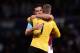 LONDON, ENGLAND - APRIL 17: Andy Carroll of West Ham United and David De Gea of Manchester United hug after the Barclays Premier League match between West Ham United and Manchester United at the Boleyn Ground on April 17, 2013 in London, England. (Photo by Jamie McDonald/Getty Images)