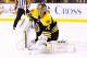 BOSTON, MA - APRIL 4: Tuukka Rask #40 of the Boston Bruins makes a glove save against the New Jersey Devils during the game on April 2, 2013 at TD Garden in Boston, Massachusetts. (Photo by Jared Wickerham/Getty Images)