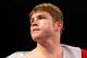 LAS VEGAS, NV - SEPTEMBER 15: Canelo Alvarez enters the arena before his WBC super welterweight title defense against Josesito Lopez at MGM Grand Garden Arena on September 15, 2012 in Las Vegas, Nevada. (Photo by Josh Hedges/Getty Images)