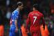 LIVERPOOL, ENGLAND - APRIL 21: Branislav Ivanovic of Chelsea talks with Luis Suarez of Liverpool as they walk in for half time during the Barclays Premier League match between Liverpool and Chelsea at Anfield on April 21, 2013 in Liverpool, England. (Photo by Michael Regan/Getty Images)