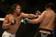 Apr 20, 2013; San Jose, CA, USA; Benson Henderson (left) fights Gilbert Melendez (right) during the lightweight championship bout of the UFC on Fuel TV at HP Pavilion. Mandatory Credit: Kyle Terada-USA TODAY Sports