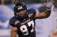 December 20, 2011; St. Petersburg, FL, USA; Fiu Golden Panthers defensive end Tourek Williams (97) rushes during the second quarter of the Beef 'O' Brady's St. Petersburg Bowl against the Marshall Thundering Herd at Tropicana Field. Mandatory Credit: Kim Klement-USA TODAY Sports