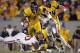 MORGANTOWN, WV - NOVEMBER 17: Tavon Austin #1 of the West Virginia Mountaineers carries the ball against Julian Wilson #2 of the Oklahoma Sooners during the game on November 17, 2012 at Mountaineer Field in Morgantown, West Virginia. (Photo by Justin K. Aller/Getty Images)