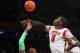 Mar 15, 2013; New York, NY, USA; Notre Dame Fighting Irish guard Eric Atkins (0) has his shot blocked by Louisville Cardinals center Gorgui Dieng (10) during the second half of a semifinal game of the Big East tournament at Madison Square Garden. Louisville won 69-57. Mandatory Credit: Brad Penner-USA TODAY Sports