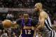 Apr 21, 2013; San Antonio, TX, USA; Los Angeles Lakers center Dwight Howard (12) drives to the basket while guarded by San Antonio Spurs forward Tim Duncan (right) during game one of the first round of the 2013 NBA Playoffs at AT&T Center. Mandatory Credit: Soobum Im-USA TODAY Sports