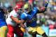 October 13, 2012; Pasadena, CA, USA; UCLA Bruins defensive end Datone Jones (56) defends against Utah Utes offensive linesman Tevita Stevens (54) during the second half at the Rose Bowl. Mandatory Credit: Gary A. Vasquez-USA TODAY Sports