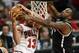 Apr 25, 2013; Chicago, IL, USA; Chicago Bulls center Joakim Noah (13) shoots the ball against Brooklyn Nets power forward Reggie Evans (30) in the second half during game three of the first round of the 2013 NBA playoffs at the United Center. Chicago defeats Brooklyn 79-76. Mandatory Credit: Mike DiNovo-USA TODAY Sports