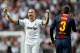 MADRID, SPAIN - MARCH 02: Pepe (L) of Real Madrid celebrates his sides victory besides Gerard Pique of Barcelona during the la Liga match between Real Madrid CF and FC Barcelona at Estadio Santiago Bernabeu on March 2, 2013 in Madrid, Spain. (Photo by Jasper Juinen/Getty Images)