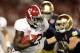 MIAMI GARDENS, FL - JANUARY 07: Eddie Lacy #42 of the Alabama Crimson Tide runs with the ball against the Notre Dame Fighting Irish during the 2013 Discover BCS National Championship game at Sun Life Stadium on January 7, 2013 in Miami Gardens, Florida. (Photo by Streeter Lecka/Getty Images)