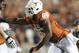 Oct 6, 2012; Austin, TX, USA; Texas Longhorns defensive end Alex Okafor (80) rushes the passer during the game against the West Virginia Mountaineers at Darrell K Royal-Texas Memorial Stadium. West Virginia beat Texas 48-45. Mandatory Credit: Tim Heitman-USA TODAY Sports