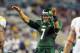 TAMPA, FL - DECEMBER 1: Quarterback B. J. Daniels #7 of the South Florida Bulls directs play against the West Virginia Mountaineers December 1, 2011 at Raymond James Stadium in Tampa, Florida. (Photo by Al Messerschmidt/Getty Images)
