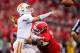 September 29, 2012; Athens, GA, USA; Georgia Bulldogs defensive lineman John Jenkins (6) hits Tennessee Volunteers quarterback Tyler Bray (8) as he throws in the second half at Sanford Stadium. The Bulldogs won 51-44. Mandatory Credit: Daniel Shirey-USA TODAY Sports