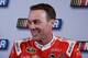Kevin "Happy" Harvick smiles while taking questions from the media. Credit: Dwight Drum