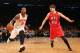 J.R. Smith (No. 8) dribbles past Kyle Korver (No. 26).